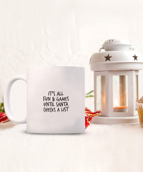 It's All Fun & Games Until Santa Checks a List 11 oz. mug